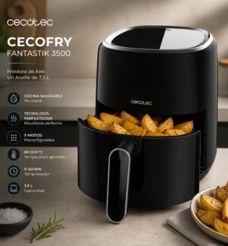 freidora de aire Cecotec Cecofry Fantastik 3500 3,5 litros con patatas doradas en cesta abierta sobre encimera de cocina moderna